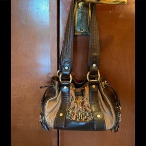 Unique Beaded drawstring leather bucket bag!